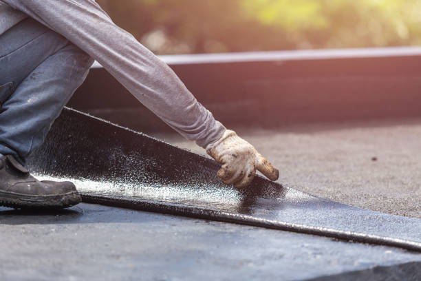 Professional Basement Waterproofing technician working in Milford Square, PA